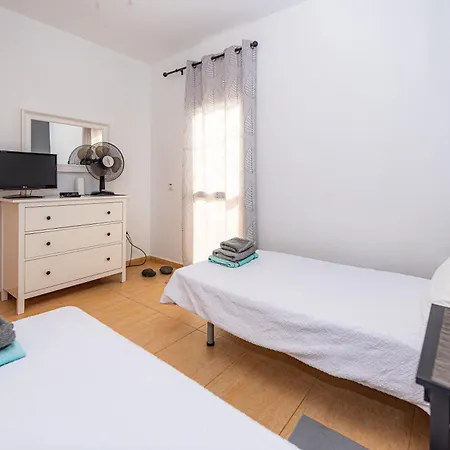 Modern 3 Bedroom House With Large Pool And Fast Internet, 100ft From The Sea - Sleeps 6 Holiday home Caleta De Fuste